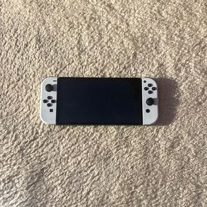 Nintendo switch console (dock and charger not shown in picture)